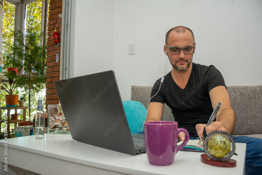 Man working in home office format during quarantine Man working in home office format during quarantine