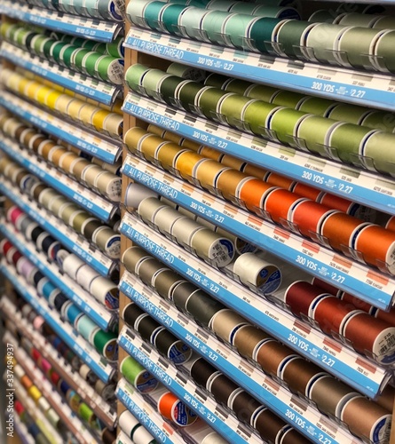 Colorful threads on display - sewing string in a variety of colors