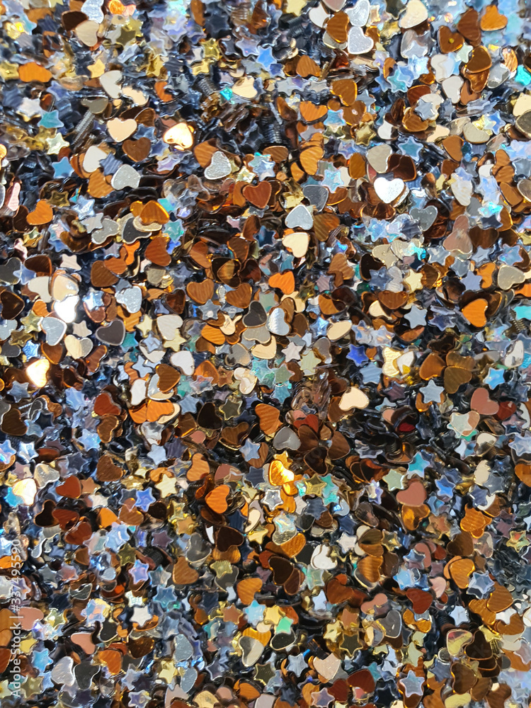 Confetti close up, various metallic colors and shapes, horizontal background Confetti close up, various metallic colors and shapes, horizontal background