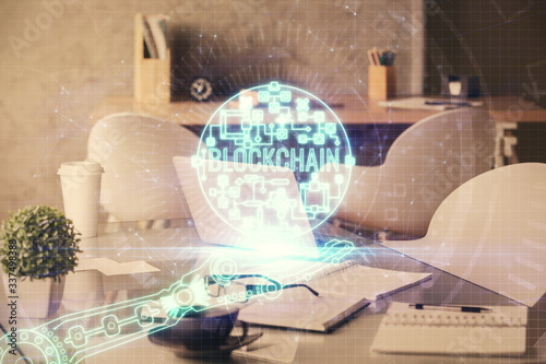 Double exposure of crypto technology theme drawing and office interior background. Concept of blockchain. © peshkova