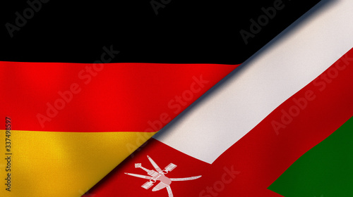 The flags of Germany and Oman. News, reportage, business background. 3d illustration