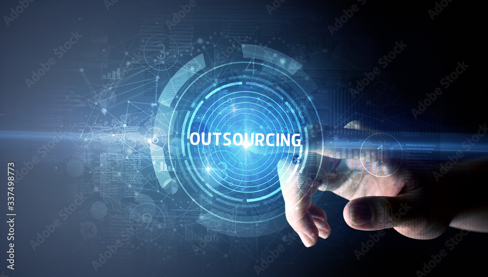 Hand touching OUTSOURCING button, modern business technology concept