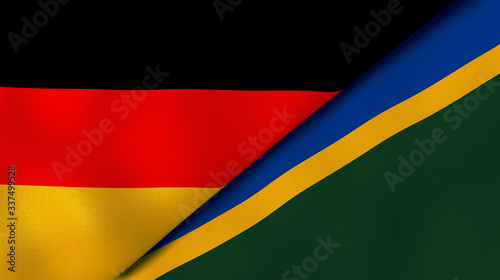 The flags of Germany and Solomon Islands. News  reportage  business background. 3d illustration