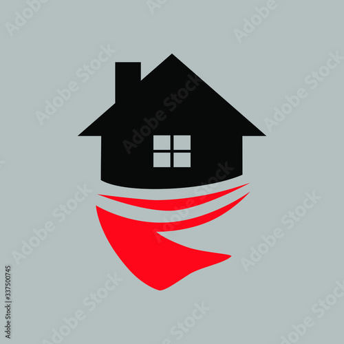 House wrapped in a red scarf symbol on gray backdrop. Stay home concept