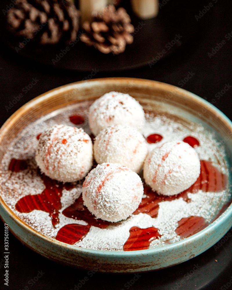 dessert balls covered with coconut chip dessert balls covered with coconut chip