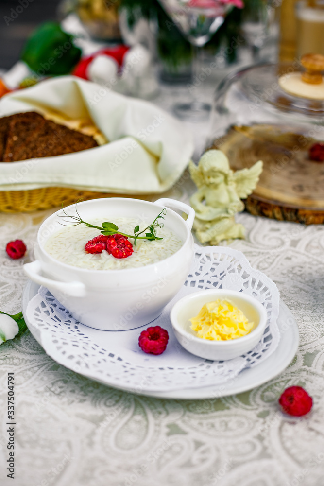 breakfast, rice porridge with butter, fruits and berries