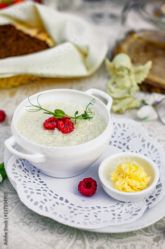 breakfast, rice porridge with butter, fruits and berries