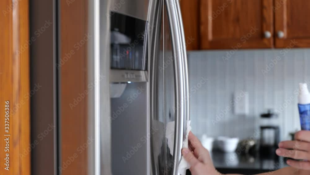 fridge door handle Disinfecting with Spray Sanitizer Paper Towel Corona virus fridge door handle Disinfecting with Spray Sanitizer Paper Towel Corona virus
