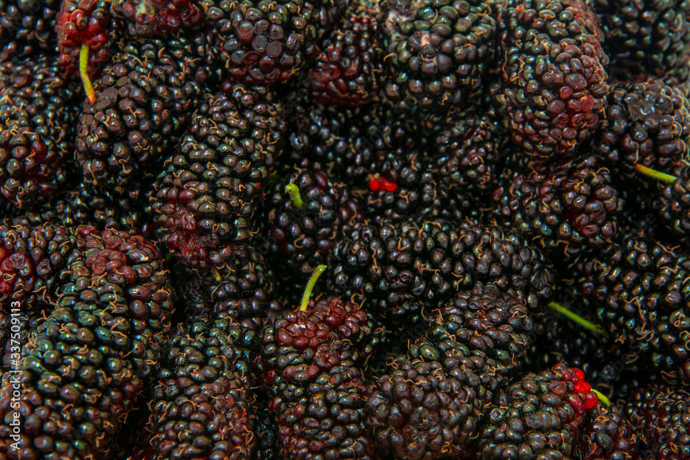 Image covered with stack of black berry Image covered with stack of black berry