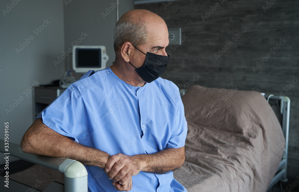 Senior man wearing face mask during corona virus and flu outbreak Senior man wearing face mask during corona virus and flu outbreak