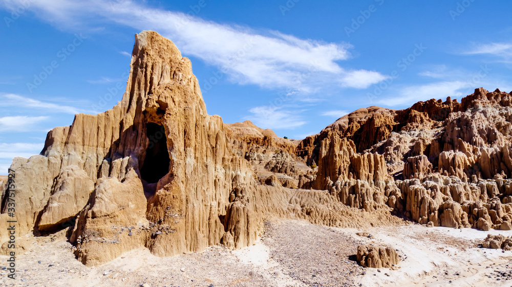 Fototapeta premium The dramatic and unique patterns of Slot Canyons and Hoodoos caused by erosion of the soft volcanic Bentonite Clay in Cathedral Gorge State Park in the Nevada Desert, United Sates