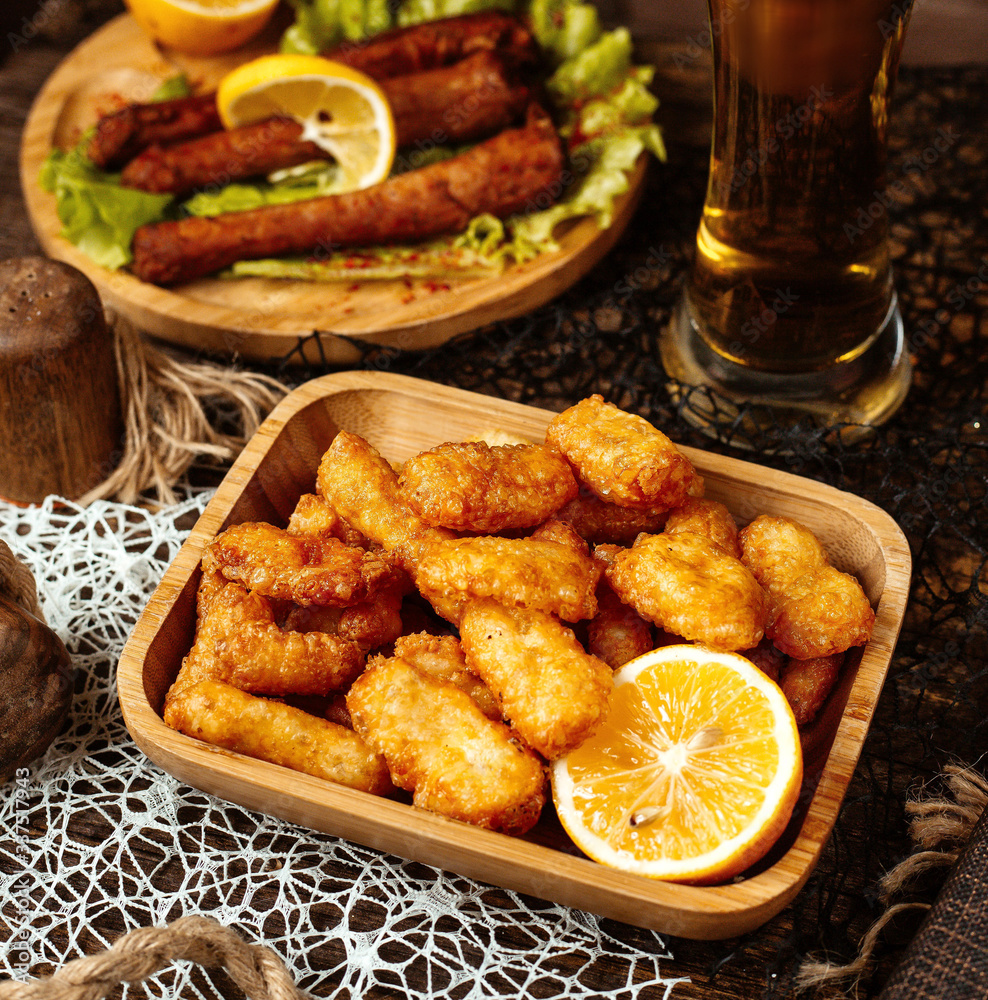 fried pigtail cheese served with lemon fried pigtail cheese served with lemon