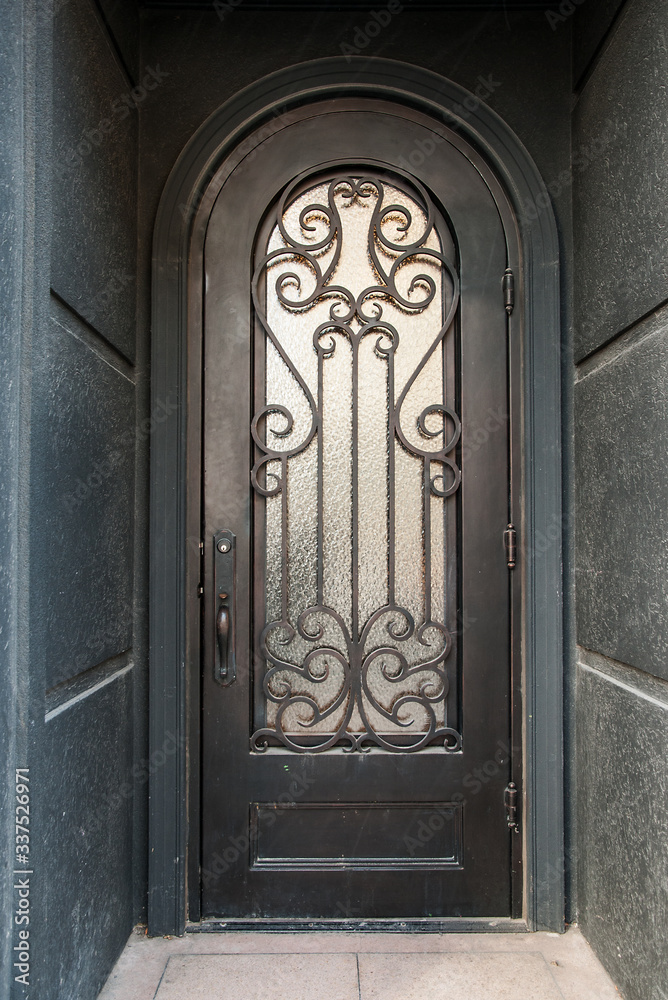 Old  doorway with ornate glass door Peterborough Ontario Canada