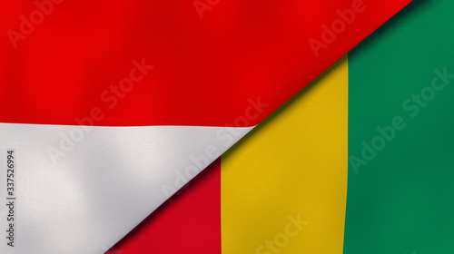 The flags of Indonesia and Guinea. News  reportage  business background. 3d illustration