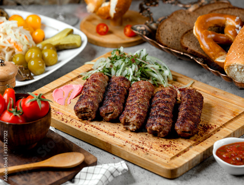 lule kebab with onions and pickles