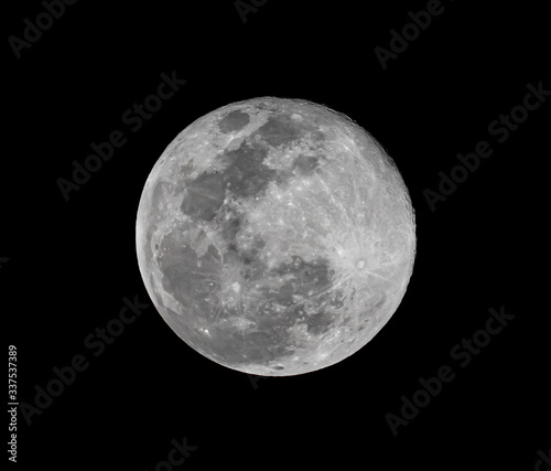Full moon isolated on black background