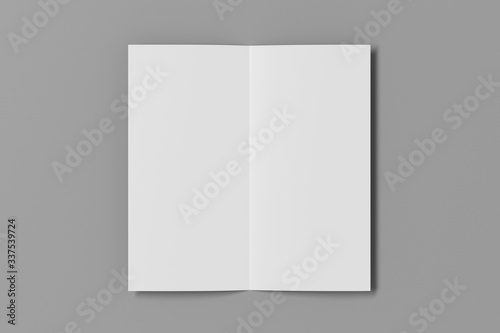 Blank square leaflet on gray background. Bi-fold or half-fold opened brochure isolated with clipping path. View directly above. 3d illustration