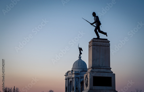 Civil war solider statues at dusk