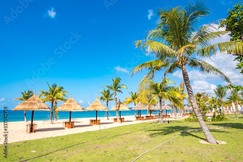 Fototapeta Naklejka Na Ścianę i Meble -  Coastal Scenery of The Long Beach on Phu Quoc Island, Vietnam, a Popular Tourism Destination for Summer Vacation in Southeast Asia, with Tropical Climate and Beautiful Landscape.