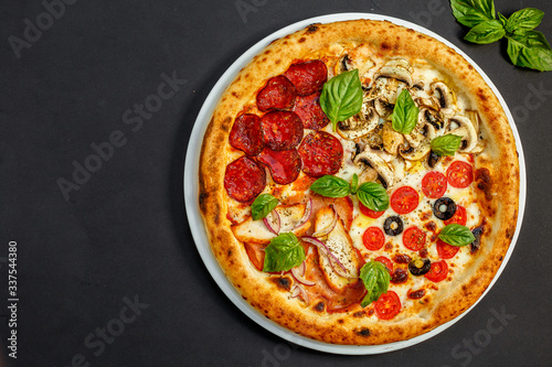 hot italian pizza with cheese and basil, isolated