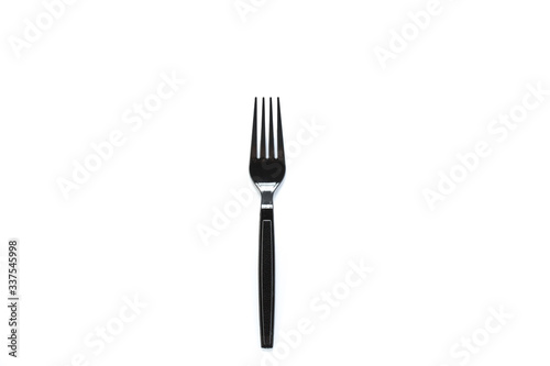 Black plastic fork isolated on white background.