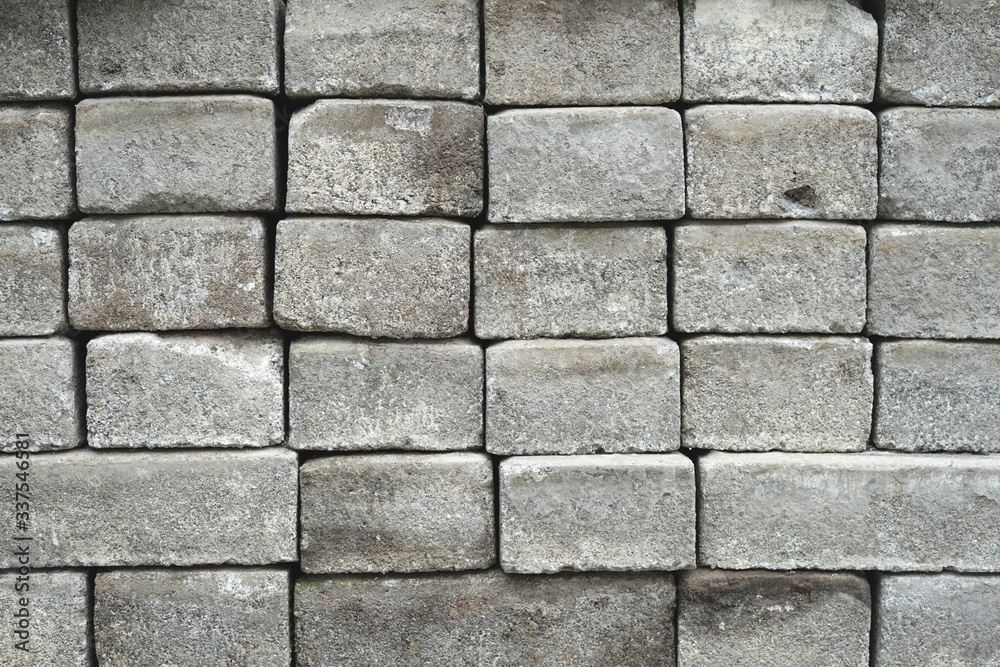 Fototapeta premium Piles of concrete paving slab pattern background