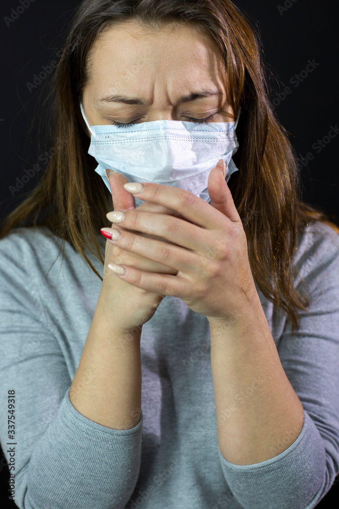 Beautiful sexy womem Coughing up blood, lung disease in protective mask with 2019-ncov written. medical mask against viruses and infections isolated studio. Coronavirus 2019-ncov covid-19 concept. Beautiful sexy womem Coughing up blood, lung disease in protective mask with 2019-ncov written. medical mask against viruses and infections isolated studio. Coronavirus 2019-ncov covid-19 concept.