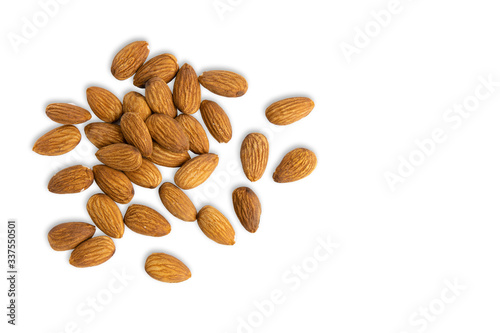 Many Almonds seeds isolate on a white background. Top view and clipping path