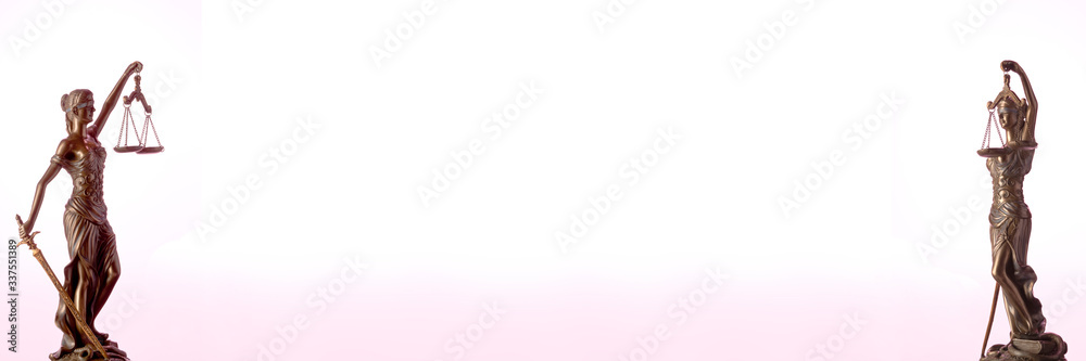 Bronze Themis statue - symbol of Justice - in a pink/violet field Bronze Themis statue - symbol of Justice - in a pink/violet field