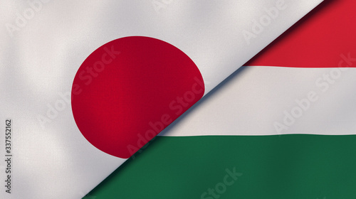 The flags of Japan and Hungary. News, reportage, business background. 3d illustration