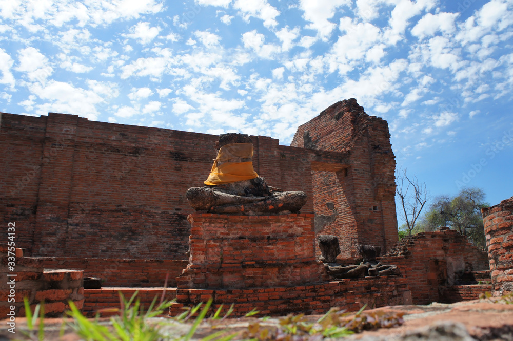 Buddha Torso wrapped in Khata in ruins temples