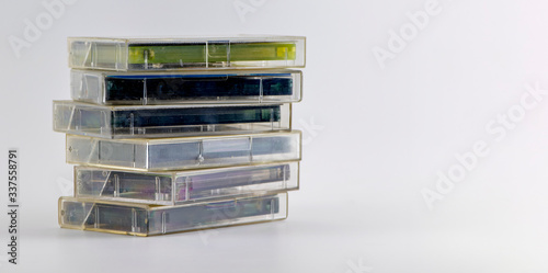 Valokuva Stacked old audio tapes, isolated