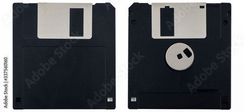 Floppy disk with front and back sides, isolated on white background. Obsolete data storage medium. Old computer technolgy.