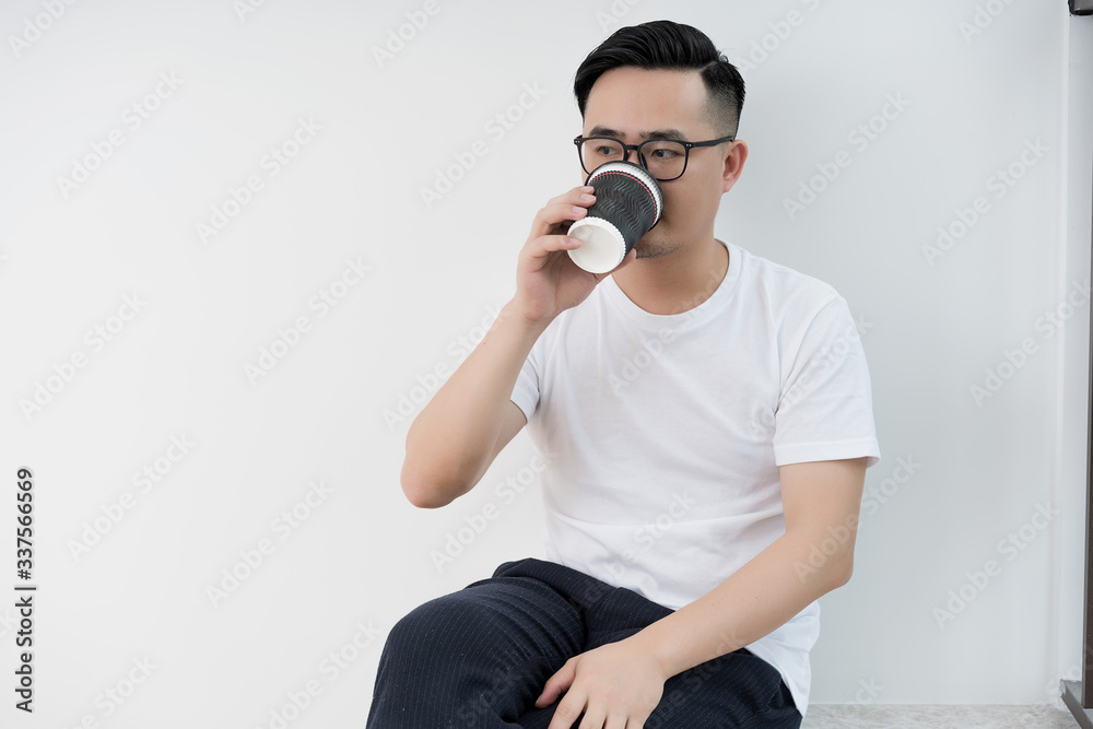 Home office scene of young Asian men Home office scene of young Asian men