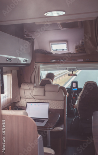 Freelancing or remote working or Telecommuting, working from home or e-commuting) digital nomad works outside the office, often working from mobile home, van life workspace technomad remote work