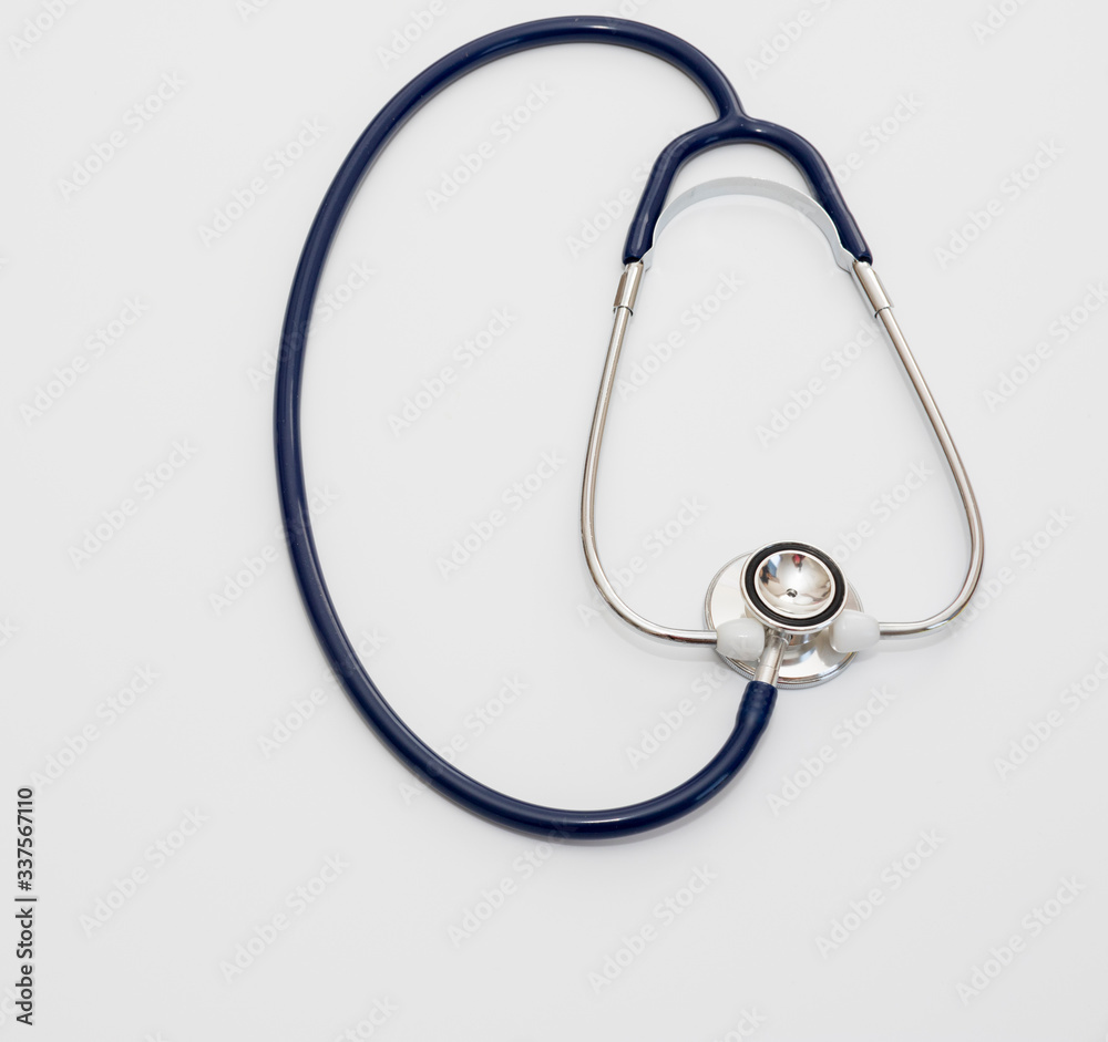 Stethoscope isolated on white, top view. Medical tool Stethoscope isolated on white, top view. Medical tool