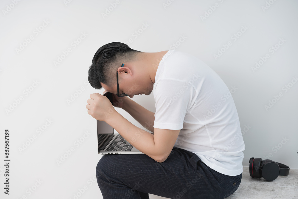 Home office scene of young Asian men Home office scene of young Asian men