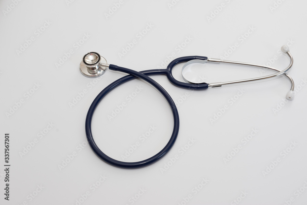 Stethoscope isolated on white, top view. Medical tool Stethoscope isolated on white, top view. Medical tool