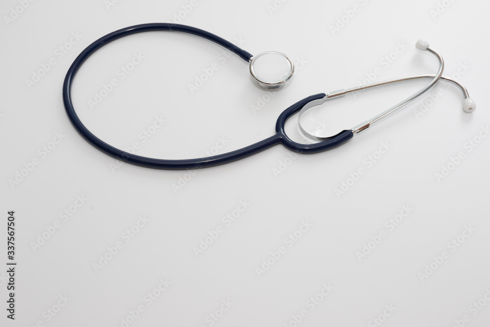 Stethoscope isolated on white, top view. Medical tool Stethoscope isolated on white, top view. Medical tool