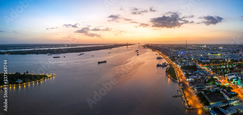 Aerial view of sunset over Mekong river, area of My Tho city, Tien Giang, Vietnam. Mekong Delta. Near Ben Tre photo