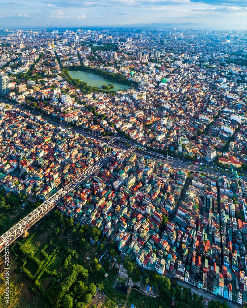 Top view aerial photo from flying drone of a Hoan Kien district, Ha Noi City with development buildings, transportation, energy power infrastructure. View from Hong river