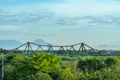 The Long Bien Bridge was constructed from 1989 to 1902 during French’s occupation of the country. Though the bridge was designed by French, it was built directly by Vietnamese workers photo