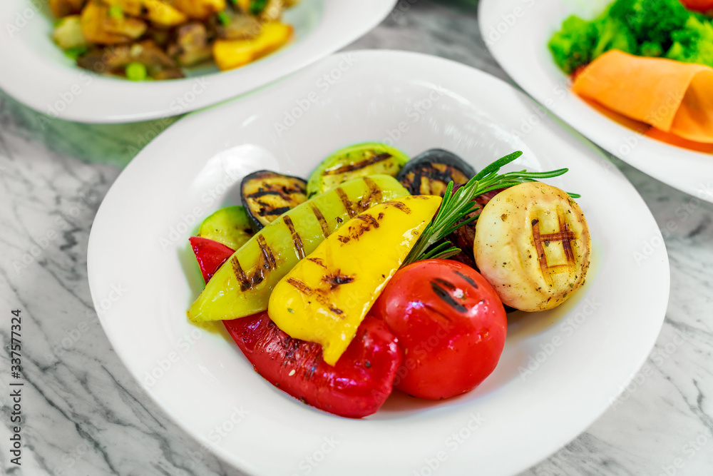 side dishes for the main course, grilled vegetables, beautiful serving side dishes for the main course, grilled vegetables, beautiful serving