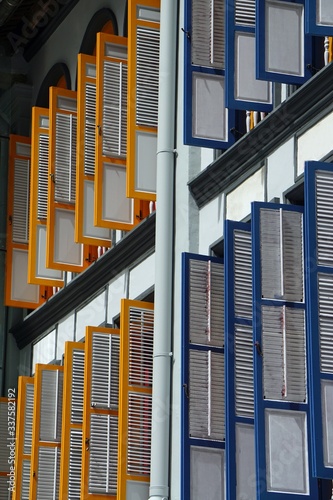 colorful wooden window shutters in singapore