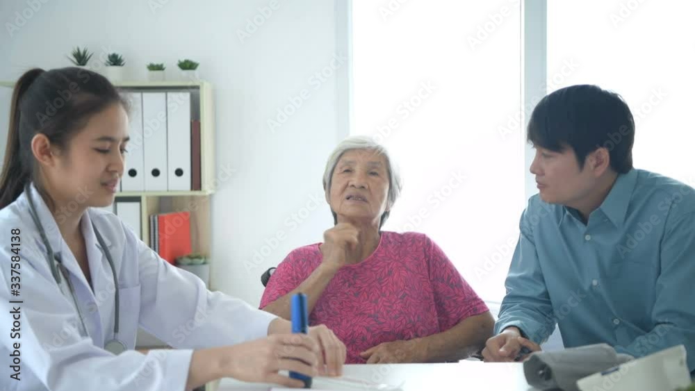 Medical concepts. The doctor is examining the throat of the patient in the hospital. 4k Resolution. Medical concepts. The doctor is examining the throat of the patient in the hospital. 4k Resolution.
