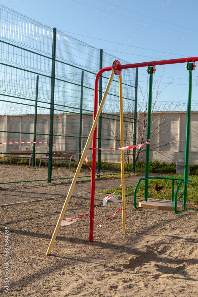 Children's Playground in quarantine. The concept of fighting covid-19.