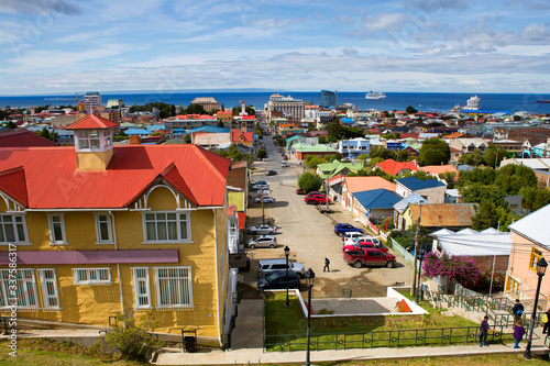 Punta Arenas, Chile, Cityscape.
 Views of Gorod Serna point. You can see the hotel building. There is a cruise ship on the reid in the Strait of Magellan. photo