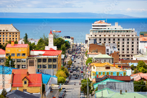 Punta Arenas, Chile, Cityscape.
View of the city and the Strait of Magellan from a vantage point . The city's Cathedral is visible to the left of the center. photo