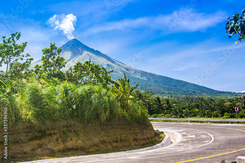 Street going to Mt. Mayon - also known as Mayon Volcano or Mount Mayon. Found in the Bicol Region in the Philippines. photo