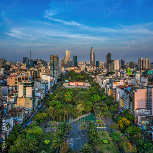 Aerial panoramic cityscape view of HoChiMinh City and 23-9 park , Vietnam with blue sky at sunset. 